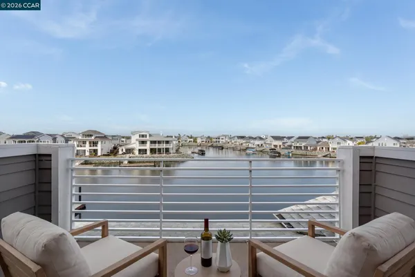a view of a balcony with city view