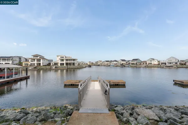 a view of a lake with a large mountain