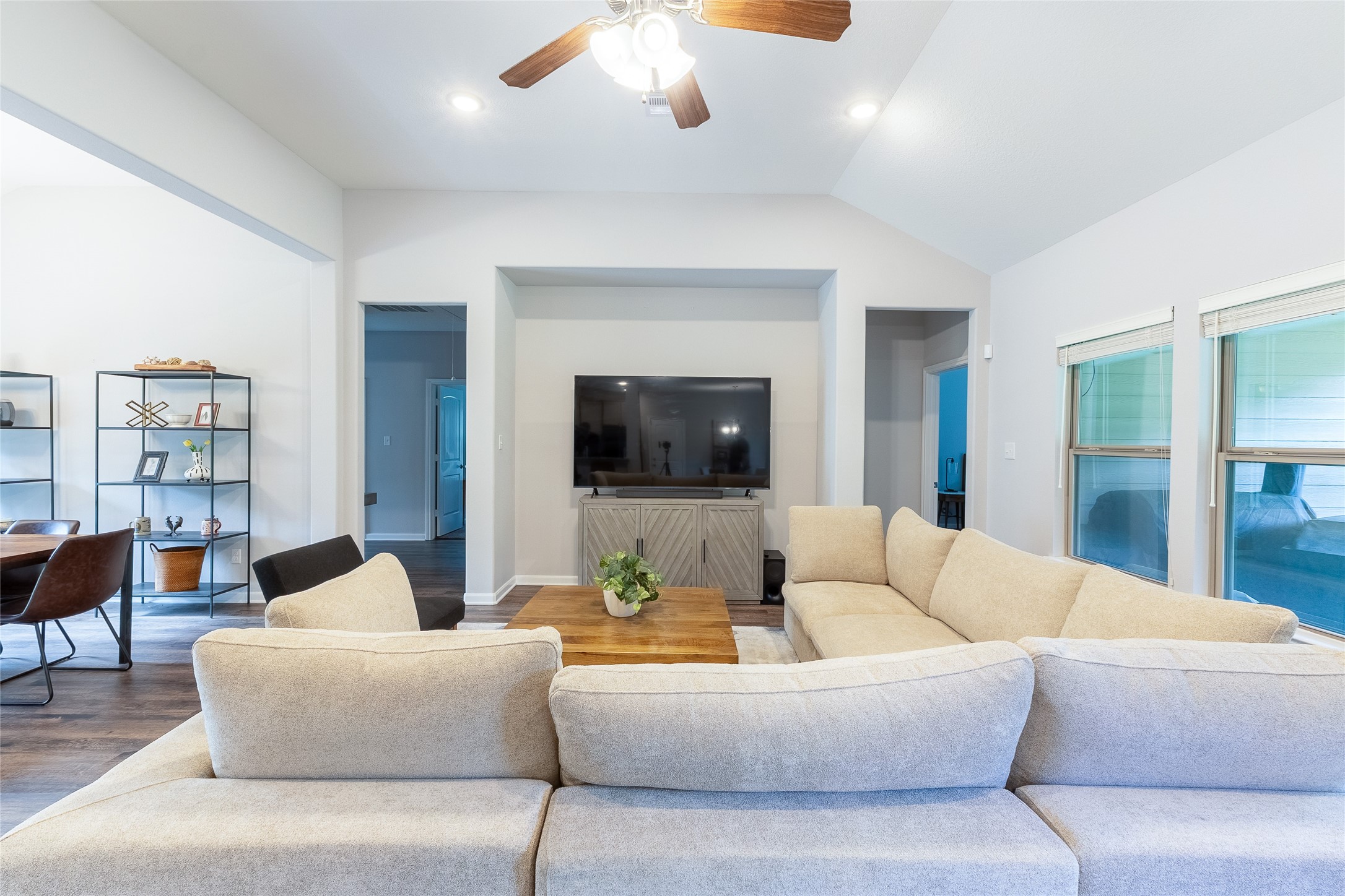 120 Sanctuary Road Huntsville, TX 77340 - Photo 13 of 38 a living room with furniture and a flat screen tv