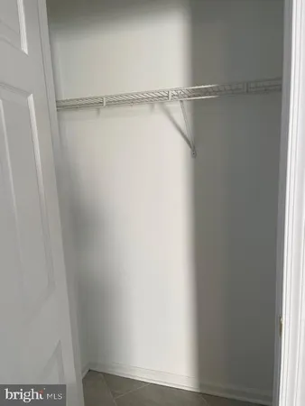 a view of small space with racks on the wall