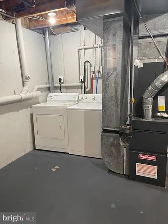 a room with a sink and a mirror