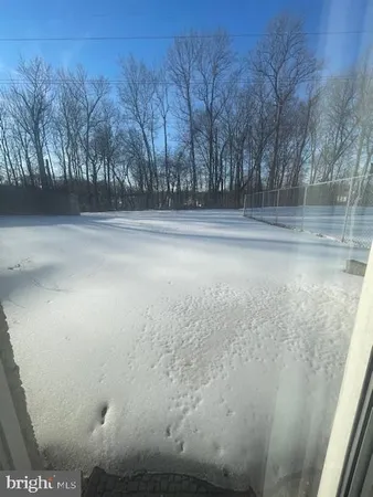 a view of road covered with snow