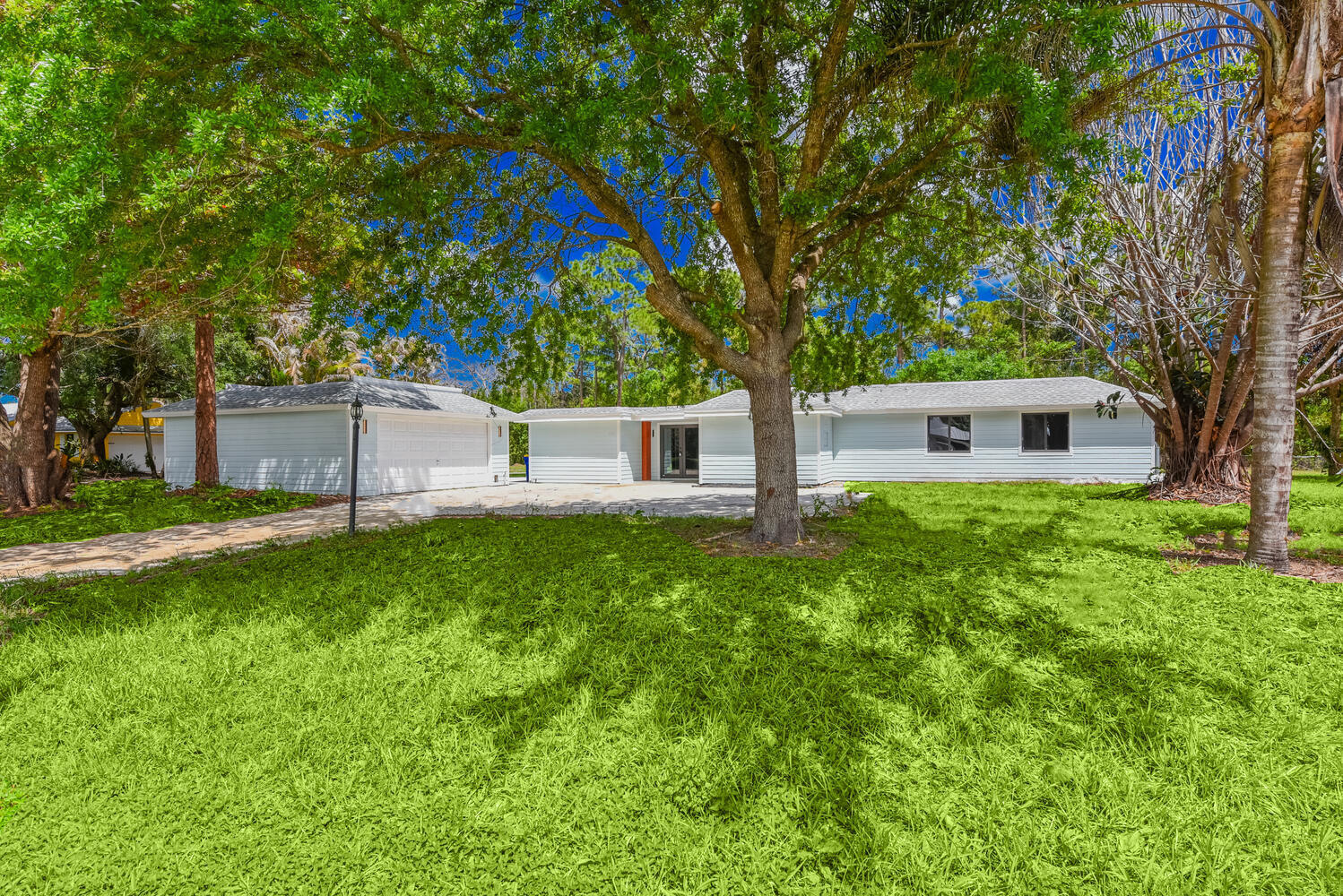 a house view with a garden space