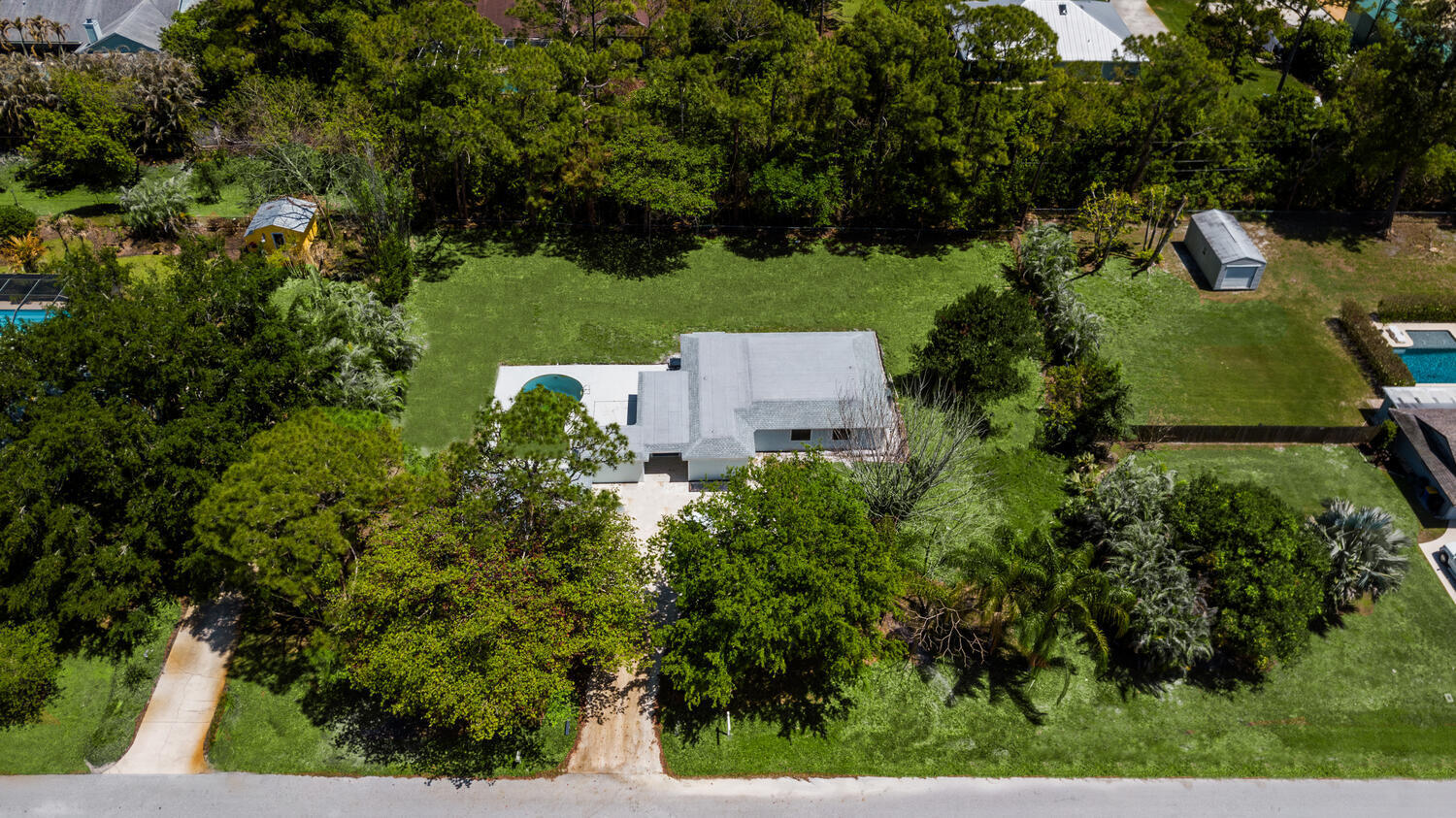 8587 Southwest 18th Avenue Stuart, FL 34997 - Photo 36 of 39 an aerial view of a house with a yard