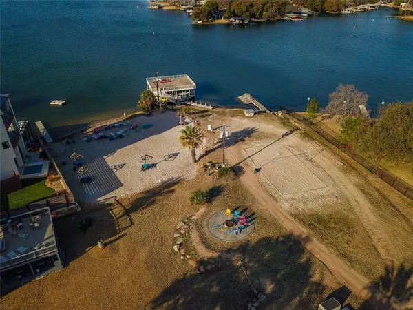 an aerial view of a house with outdoor space