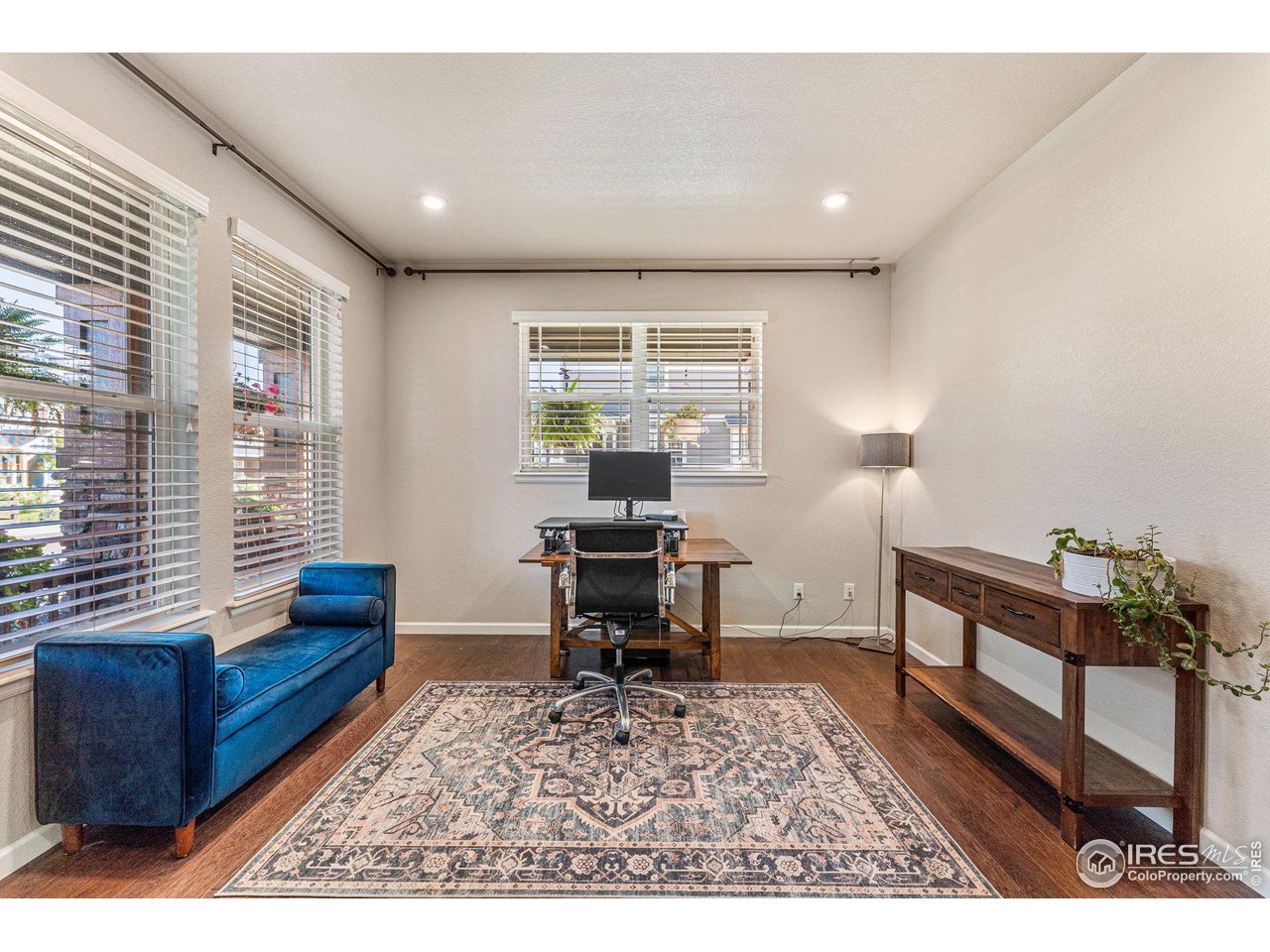 1908 Pioneer Circle Lafayette, CO 80026 - Photo 14 of 40 a living room with furniture and a window
