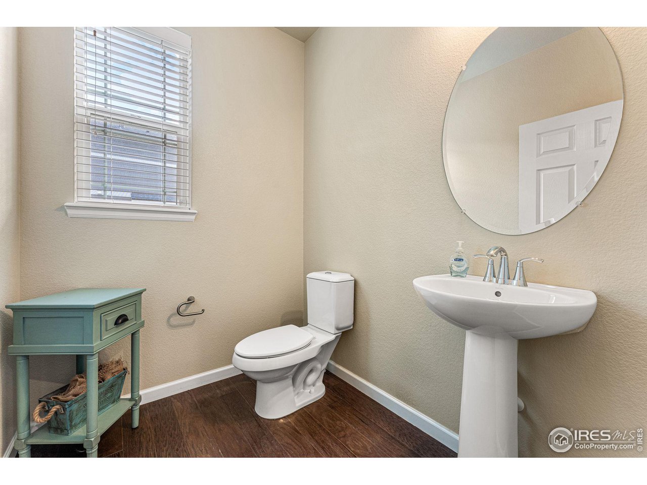 1908 Pioneer Circle Lafayette, CO 80026 - Photo 15 of 40 a bathroom with a sink and a mirror