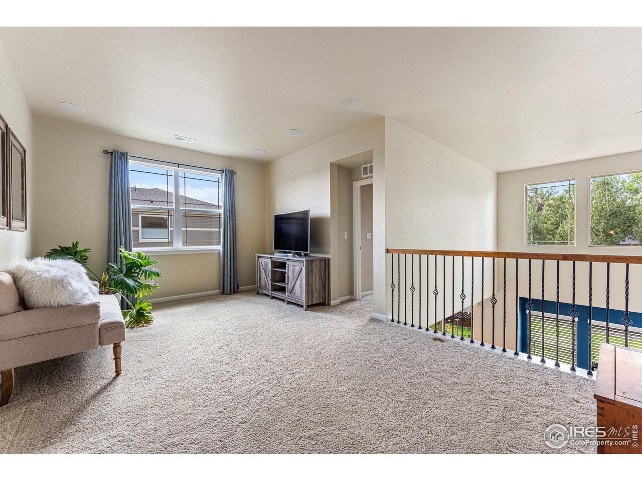 1908 Pioneer Circle Lafayette, CO 80026 - Photo 19 of 40 a view of a livingroom with furniture and windows
