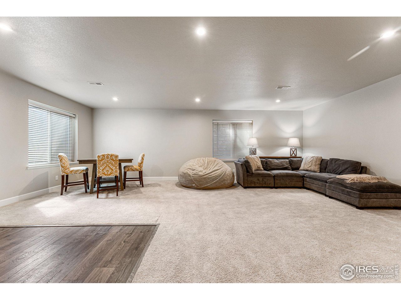 1908 Pioneer Circle Lafayette, CO 80026 - Photo 25 of 40 a living room with furniture and a large window