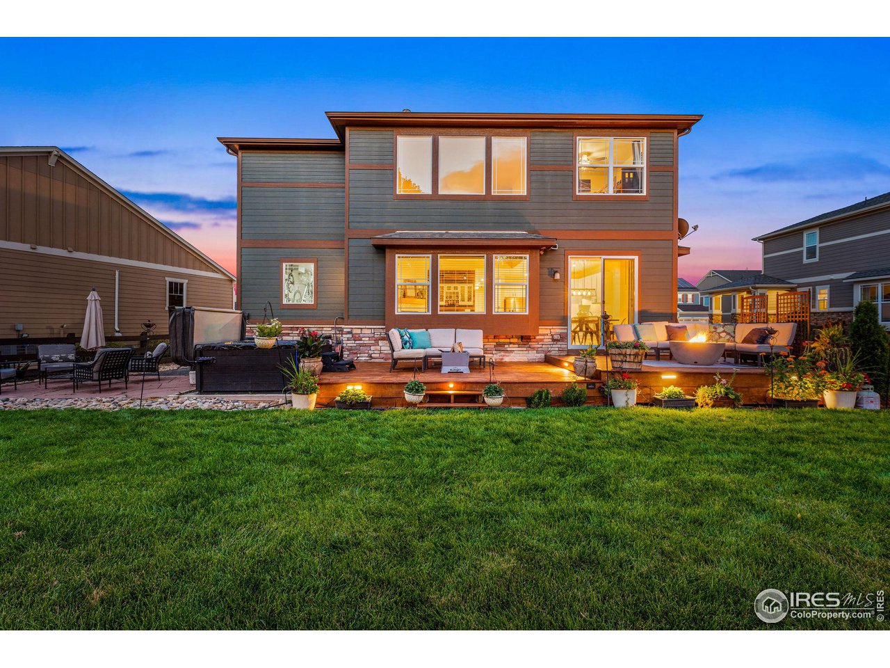 1908 Pioneer Circle Lafayette, CO 80026 - Photo 35 of 40 a group of people sitting in front of a building