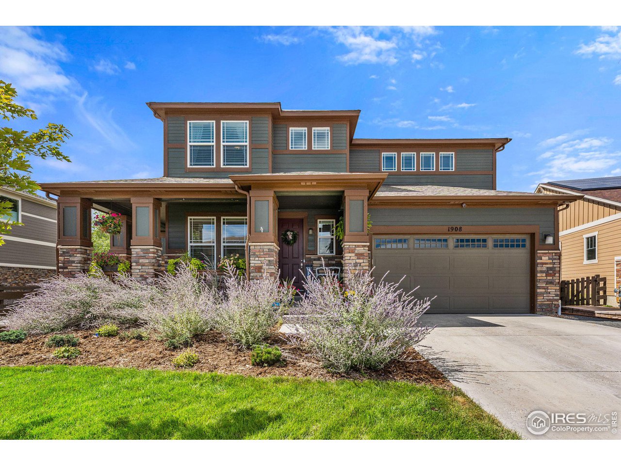 1908 Pioneer Circle Lafayette, CO 80026 - Photo 36 of 40 a front view of a house with garden