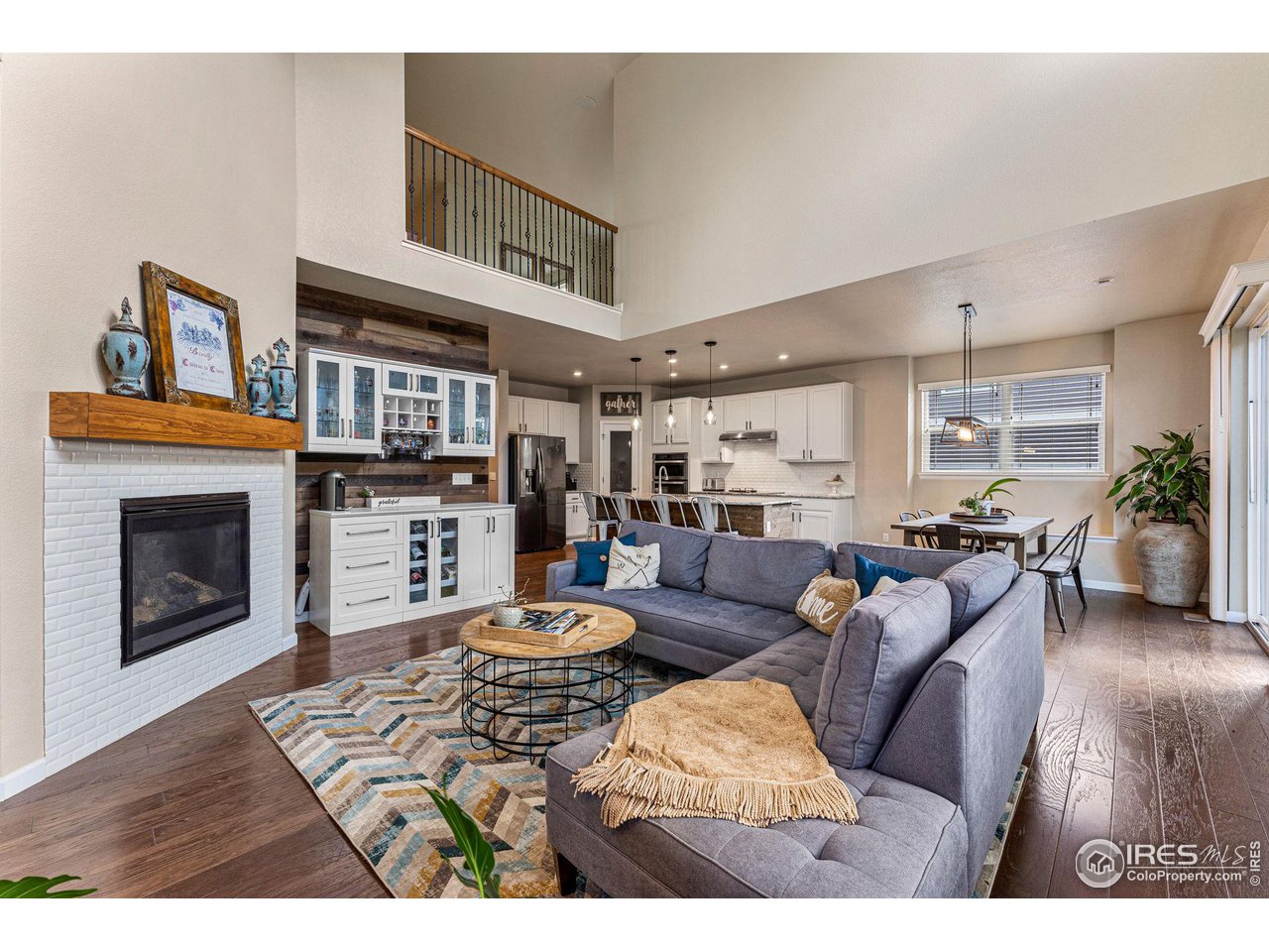 1908 Pioneer Circle Lafayette, CO 80026 - Photo 8 of 40 a living room with furniture and a fireplace