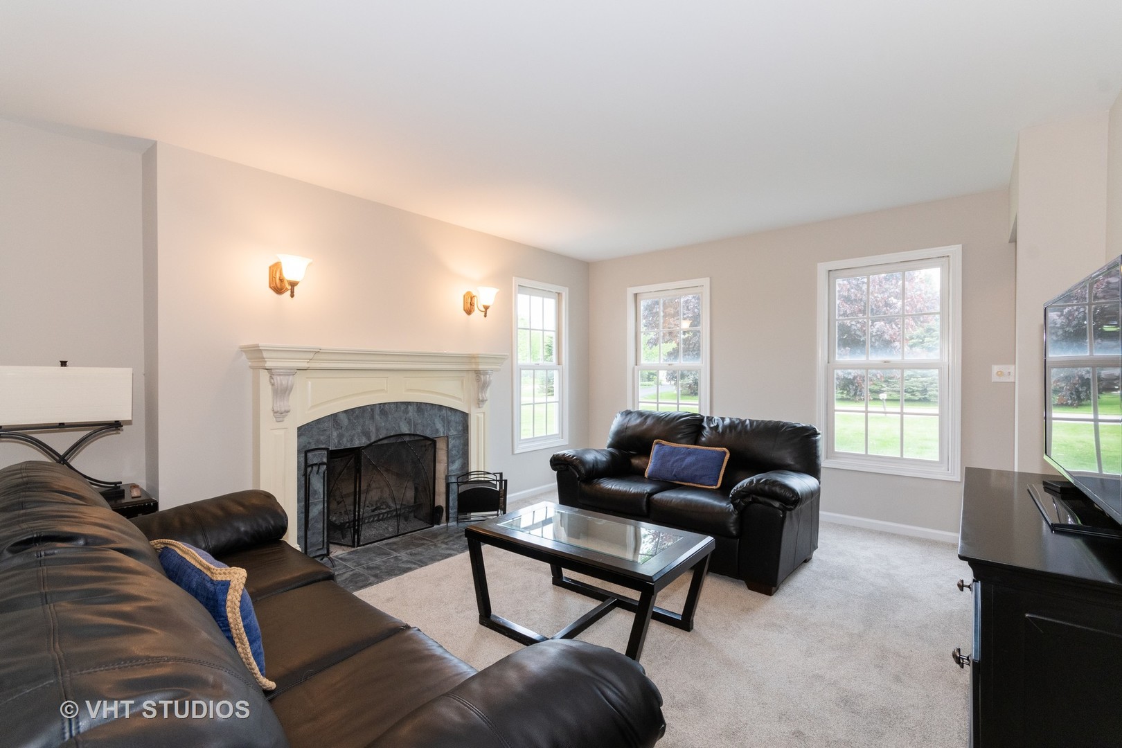 41W910 Verhaeghe Road St. Charles, IL 60175 - Photo 2 of 18 a living room with furniture and a fireplace