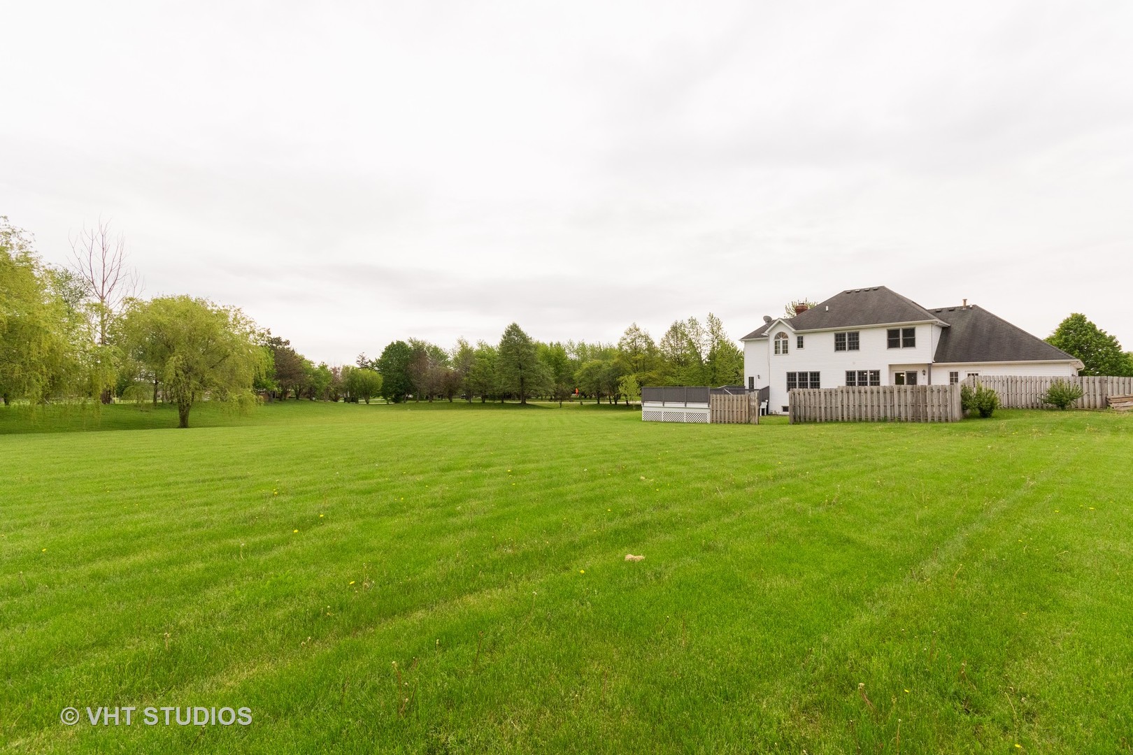 41W910 Verhaeghe Road St. Charles, IL 60175 - Photo 17 of 18 a view of a big yard with plants and large trees