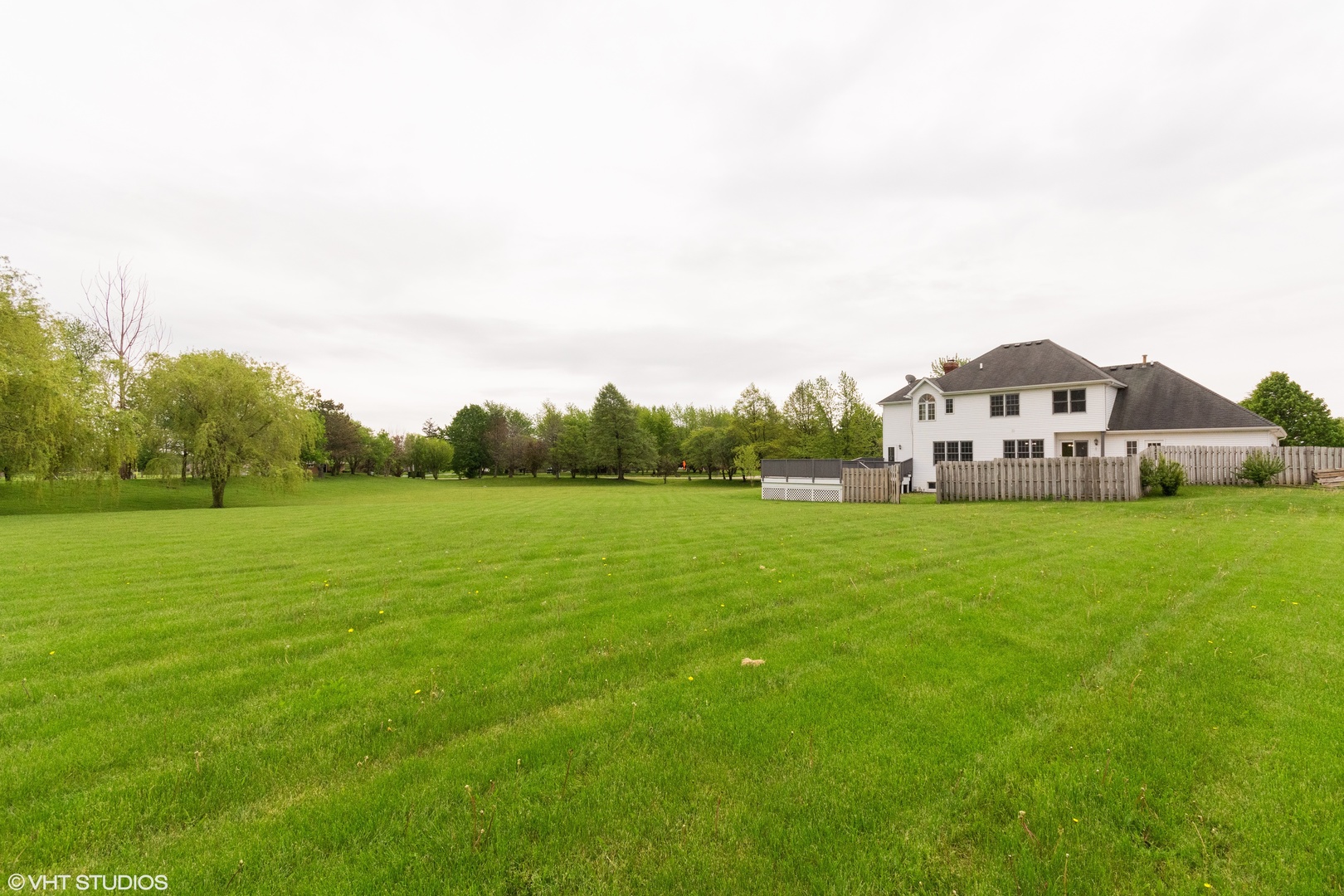41W910 Verhaeghe Road St. Charles, IL 60175 - Photo 18 of 18 a view of a big yard with plants and large trees