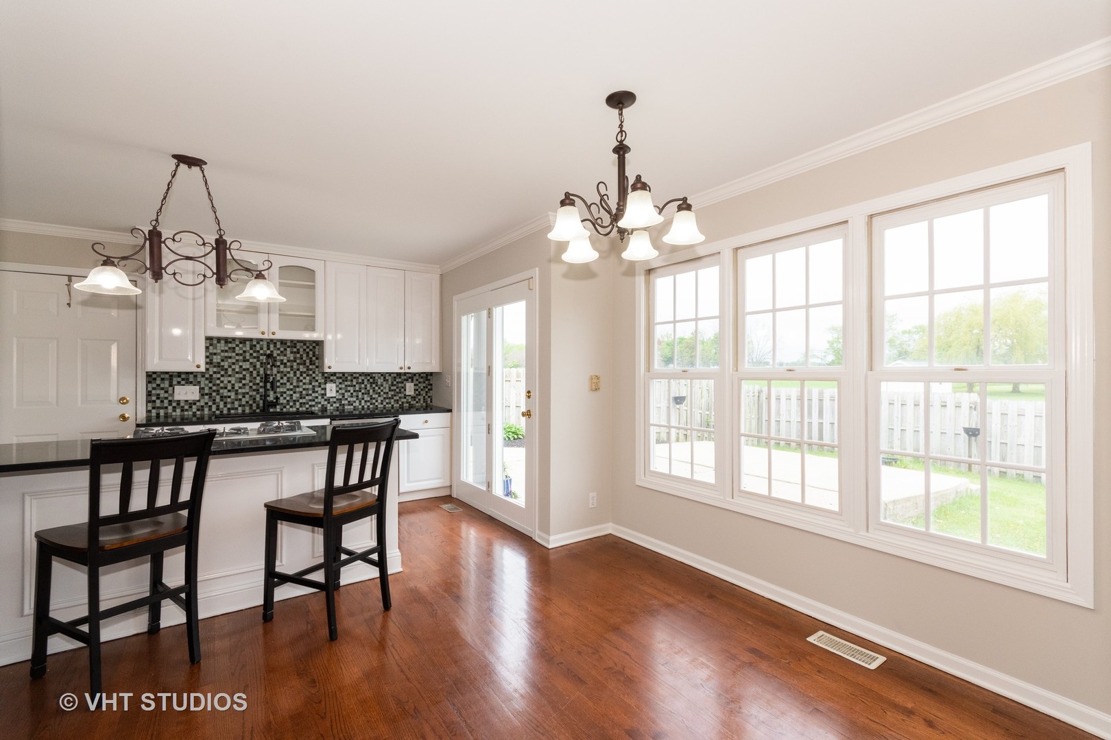 41W910 Verhaeghe Road St. Charles, IL 60175 - Photo 5 of 18 a view of a dining room with furniture window and wooden floor