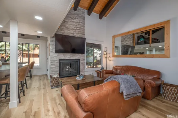 a living room with furniture and a table