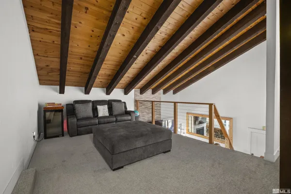 a bedroom with furniture and window