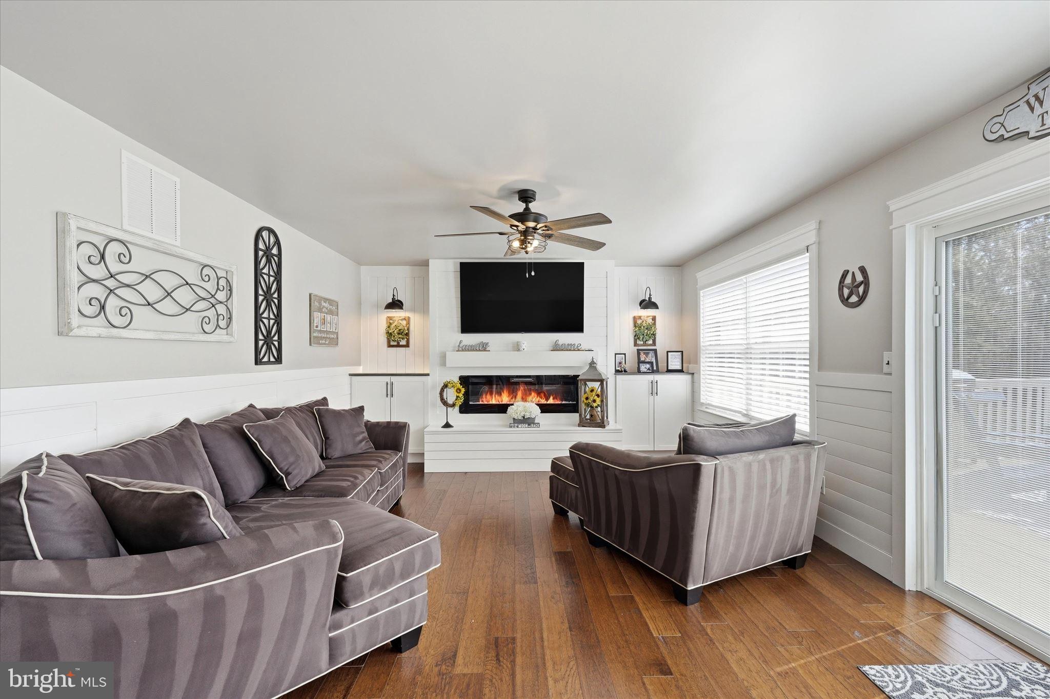 176 Warren Grove Road Barnegat, NJ 08005 - Photo 29 of 71 a living room with furniture and a flat screen tv