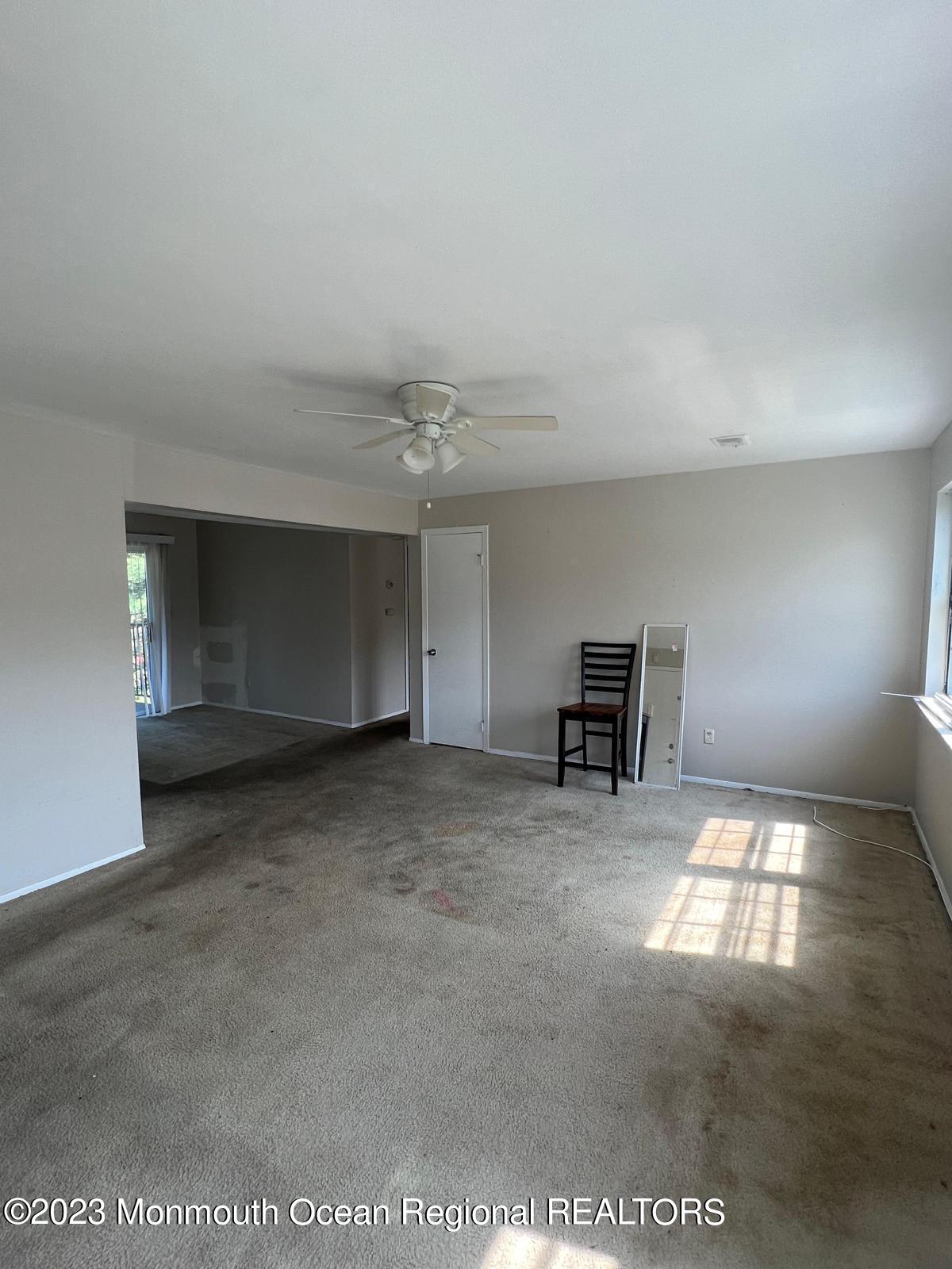 262 A Sawmill Road Brick, NJ 08724 - Photo 3 of 6 a view of an empty room and window
