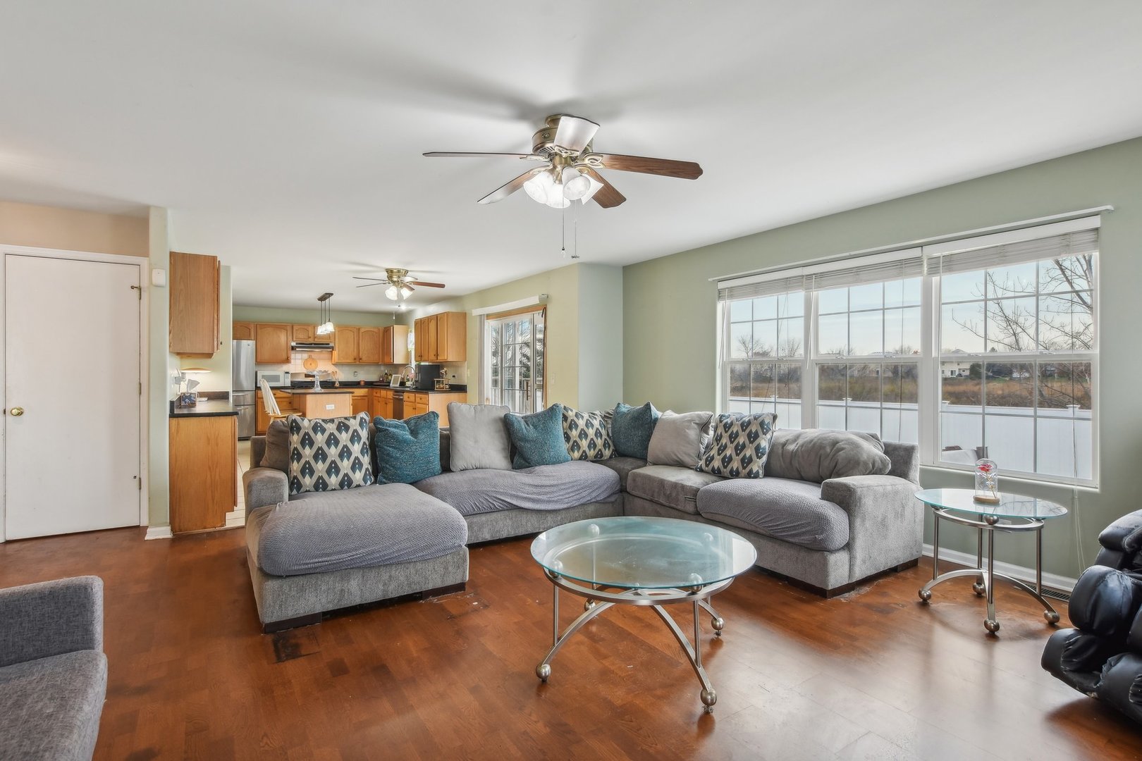 1608 Prairieview Boulevard Bolingbrook, IL 60490 - Photo 11 of 55 a living room with furniture and a large window