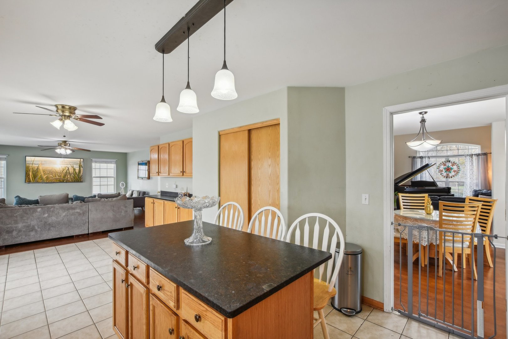 1608 Prairieview Boulevard Bolingbrook, IL 60490 - Photo 17 of 55 a view of a kitchen and dining room