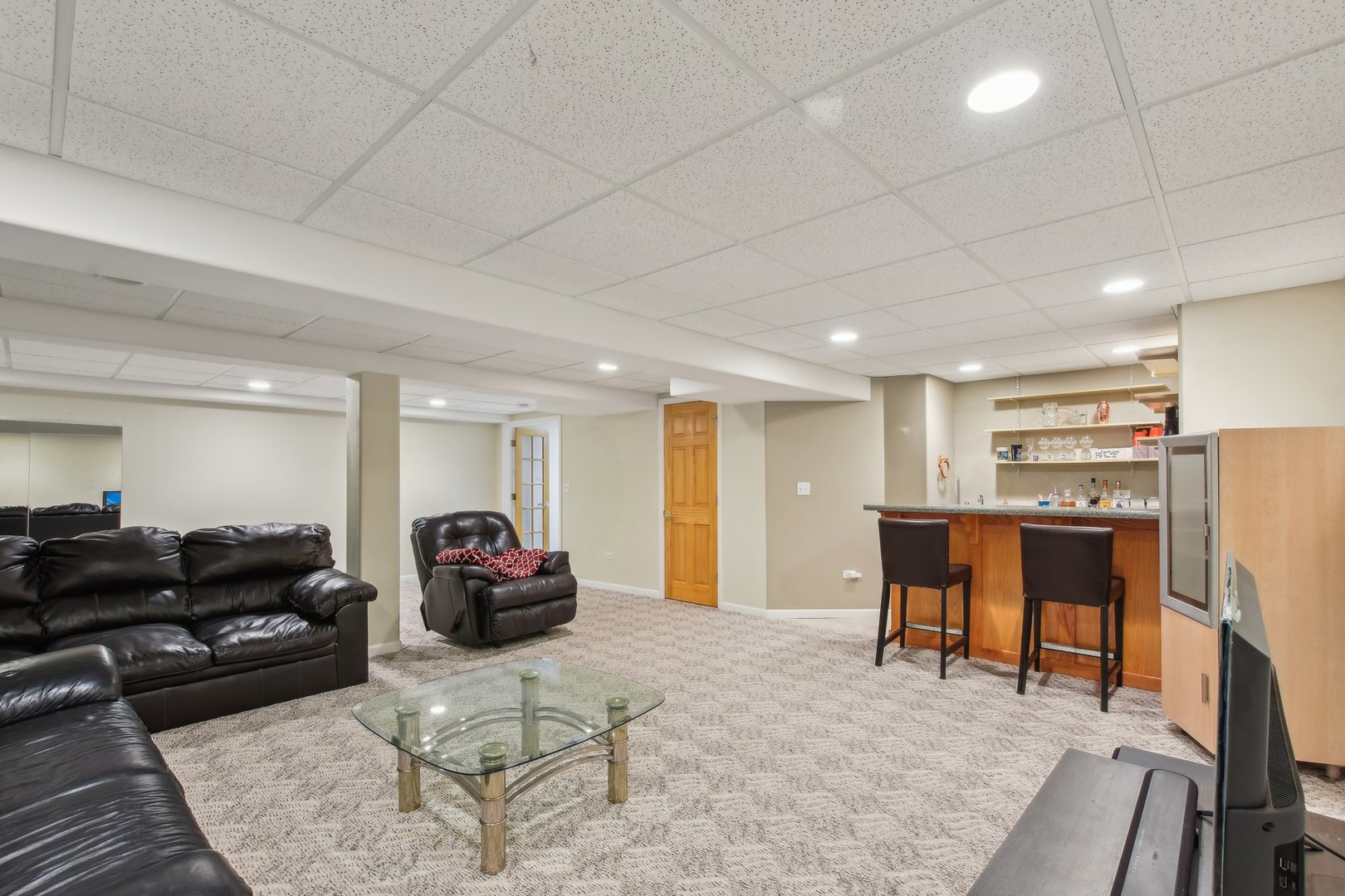 1608 Prairieview Boulevard Bolingbrook, IL 60490 - Photo 36 of 55 a living room with furniture kitchen view and a refrigerator