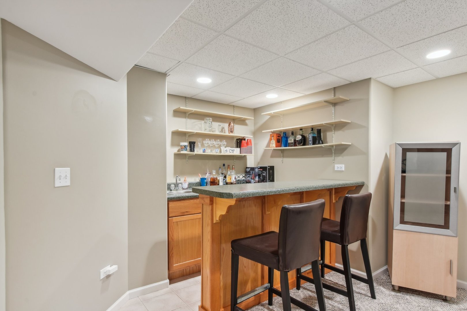 1608 Prairieview Boulevard Bolingbrook, IL 60490 - Photo 38 of 55 a dining table chair in a kitchen