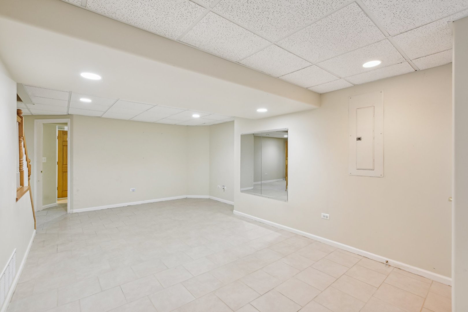 1608 Prairieview Boulevard Bolingbrook, IL 60490 - Photo 41 of 55 an empty room with a natural light