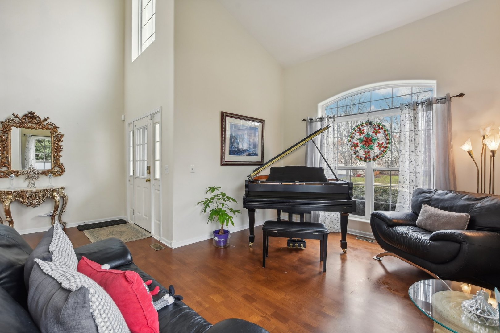 1608 Prairieview Boulevard Bolingbrook, IL 60490 - Photo 5 of 55 a living room with furniture and a piano