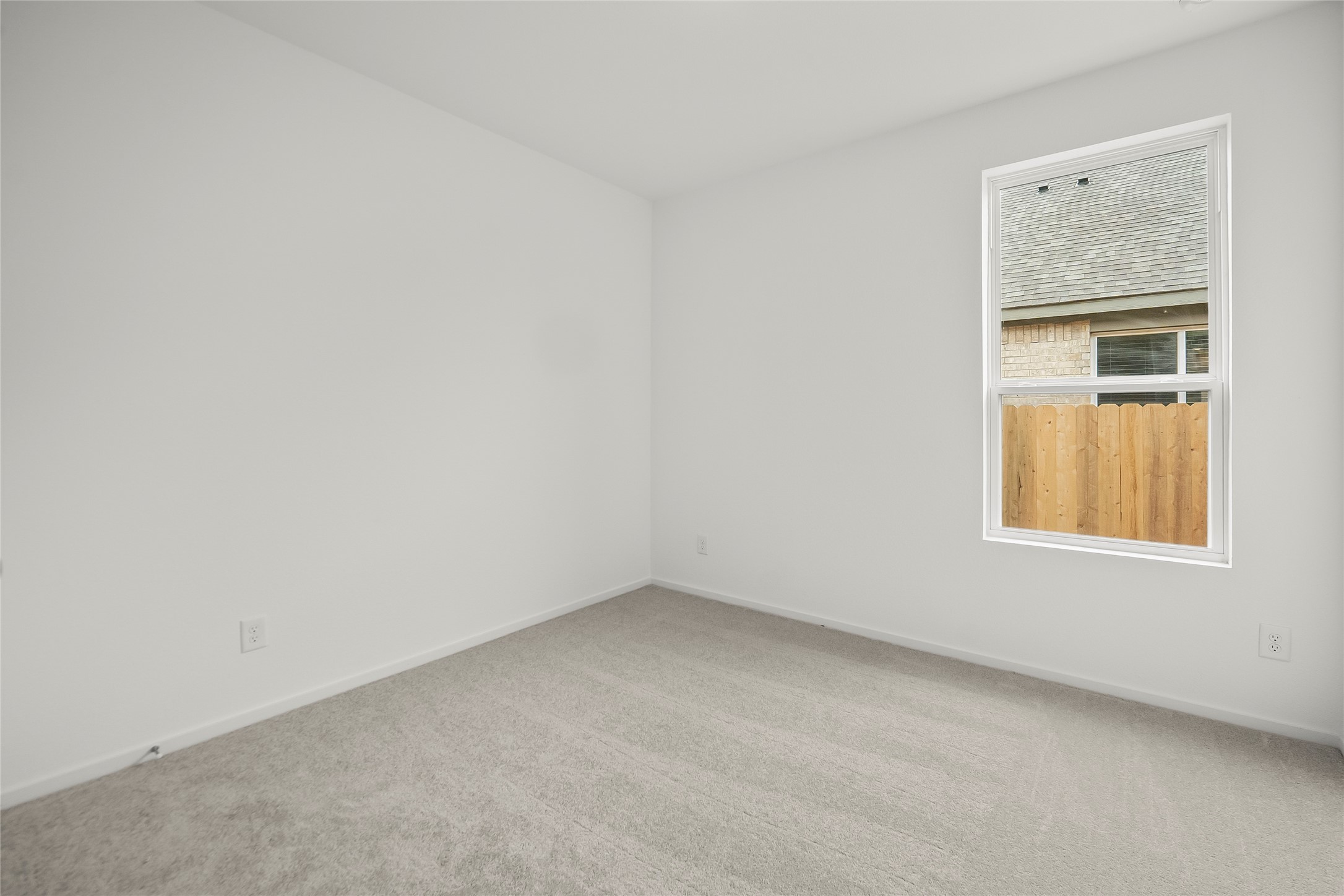 7750 Montana Ruby Drive Rosharon, TX 77583 - Photo 7 of 31 an empty room with a window