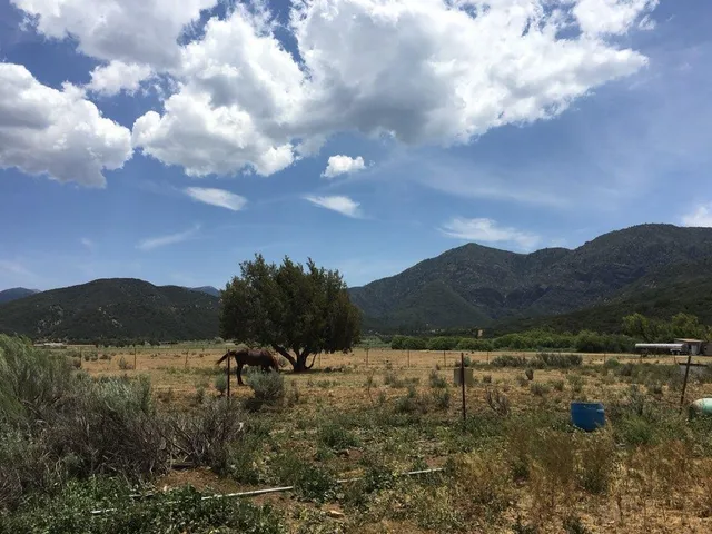 a view of mountain with lake view