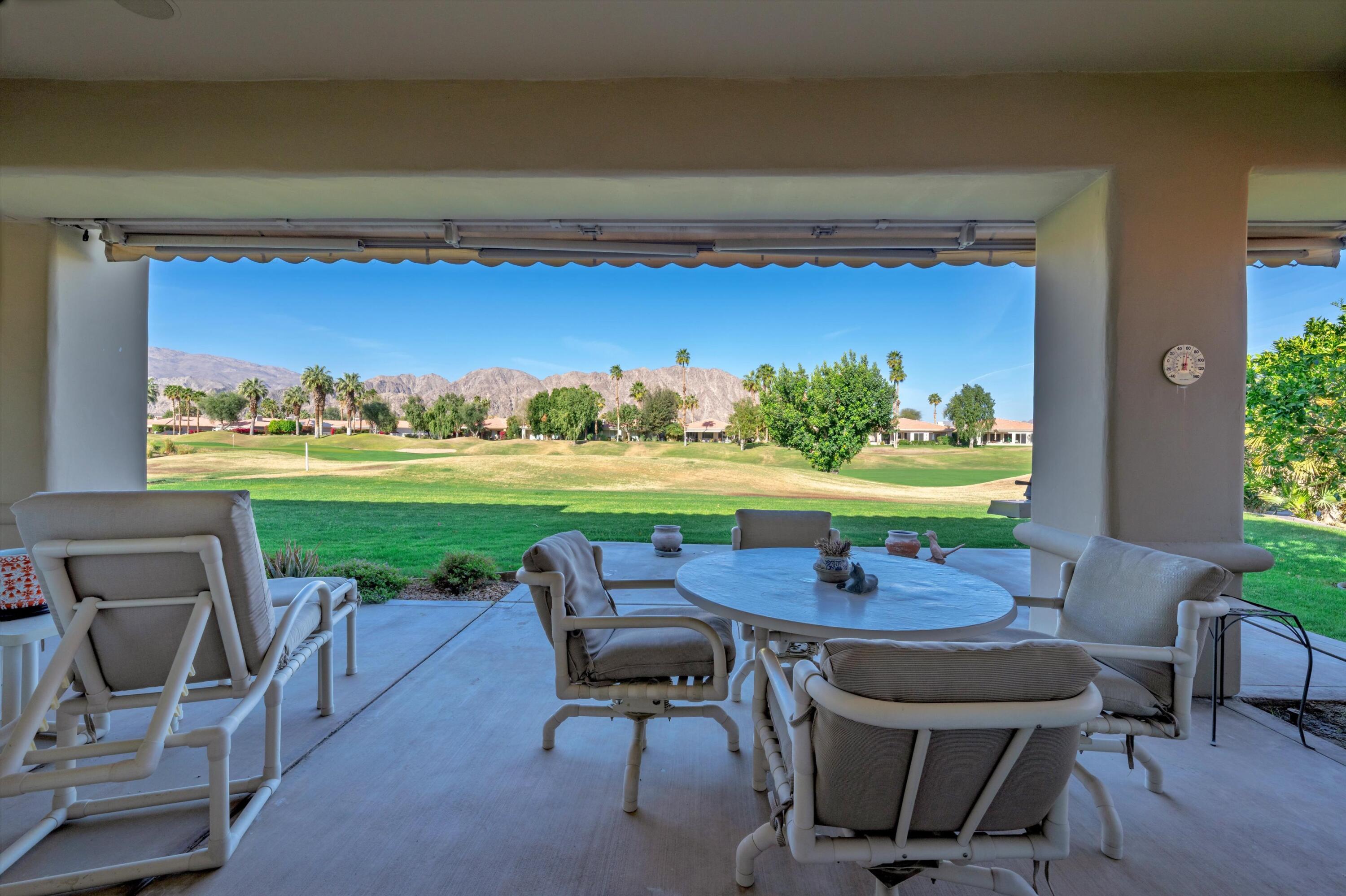 55151 Laurel Valley La Quinta, CA 92253 - Photo 12 of 43 a view of a chairs and table in patio