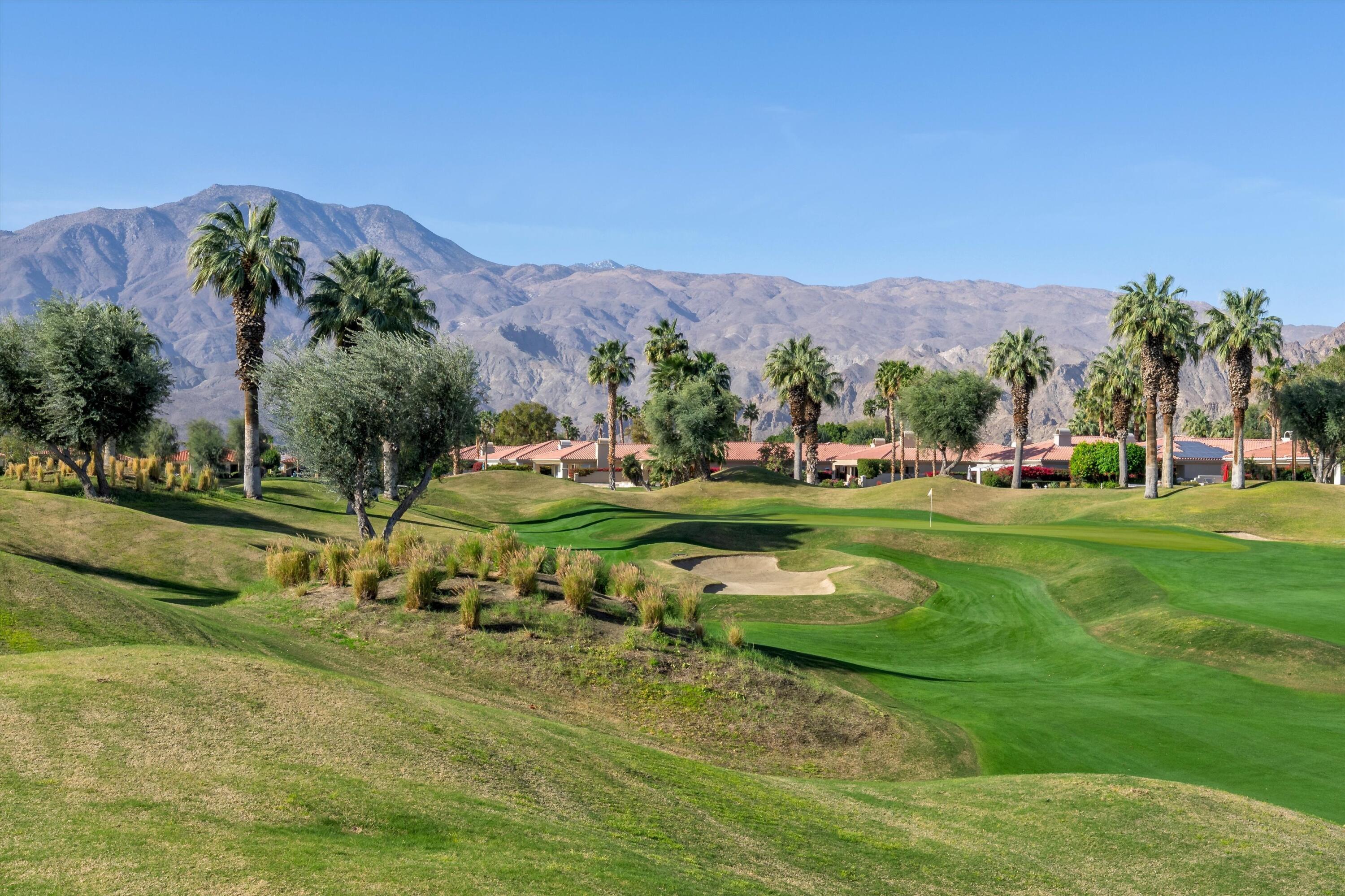 55151 Laurel Valley La Quinta, CA 92253 - Photo 14 of 43 a view of a golf course with a garden