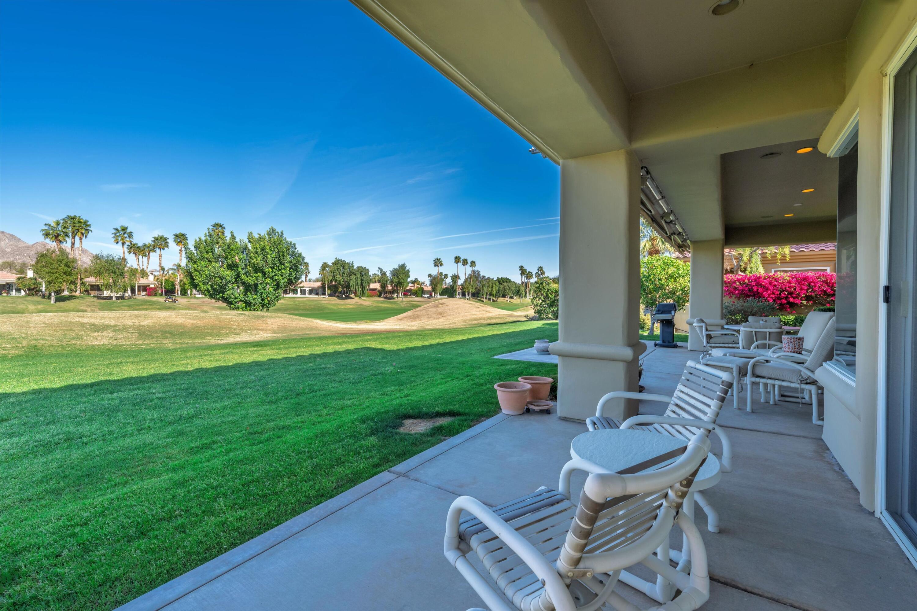 55151 Laurel Valley La Quinta, CA 92253 - Photo 15 of 43 a view of a backyard with sitting area