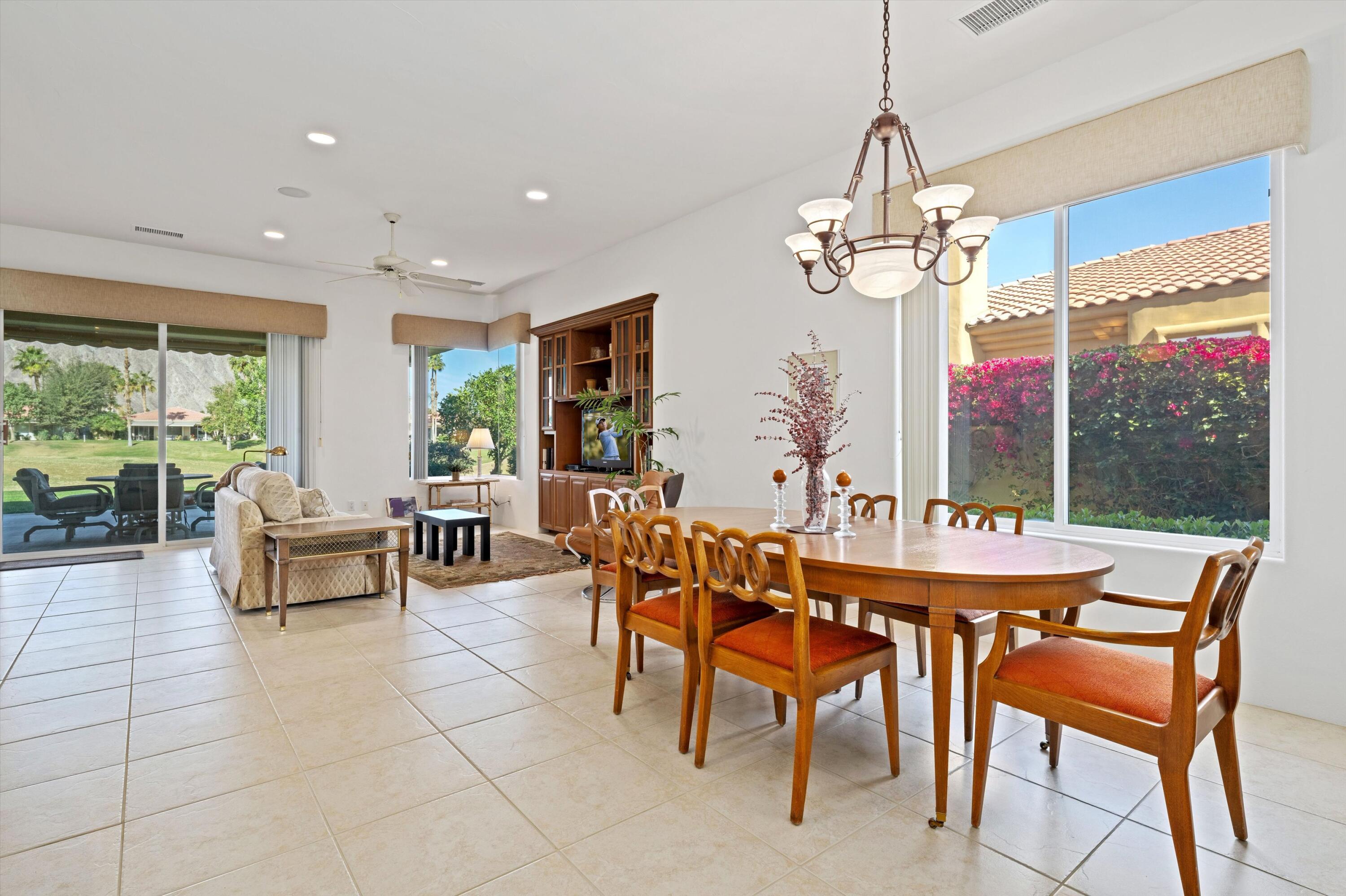 55151 Laurel Valley La Quinta, CA 92253 - Photo 19 of 43 a view of a dining room with furniture window and outside view