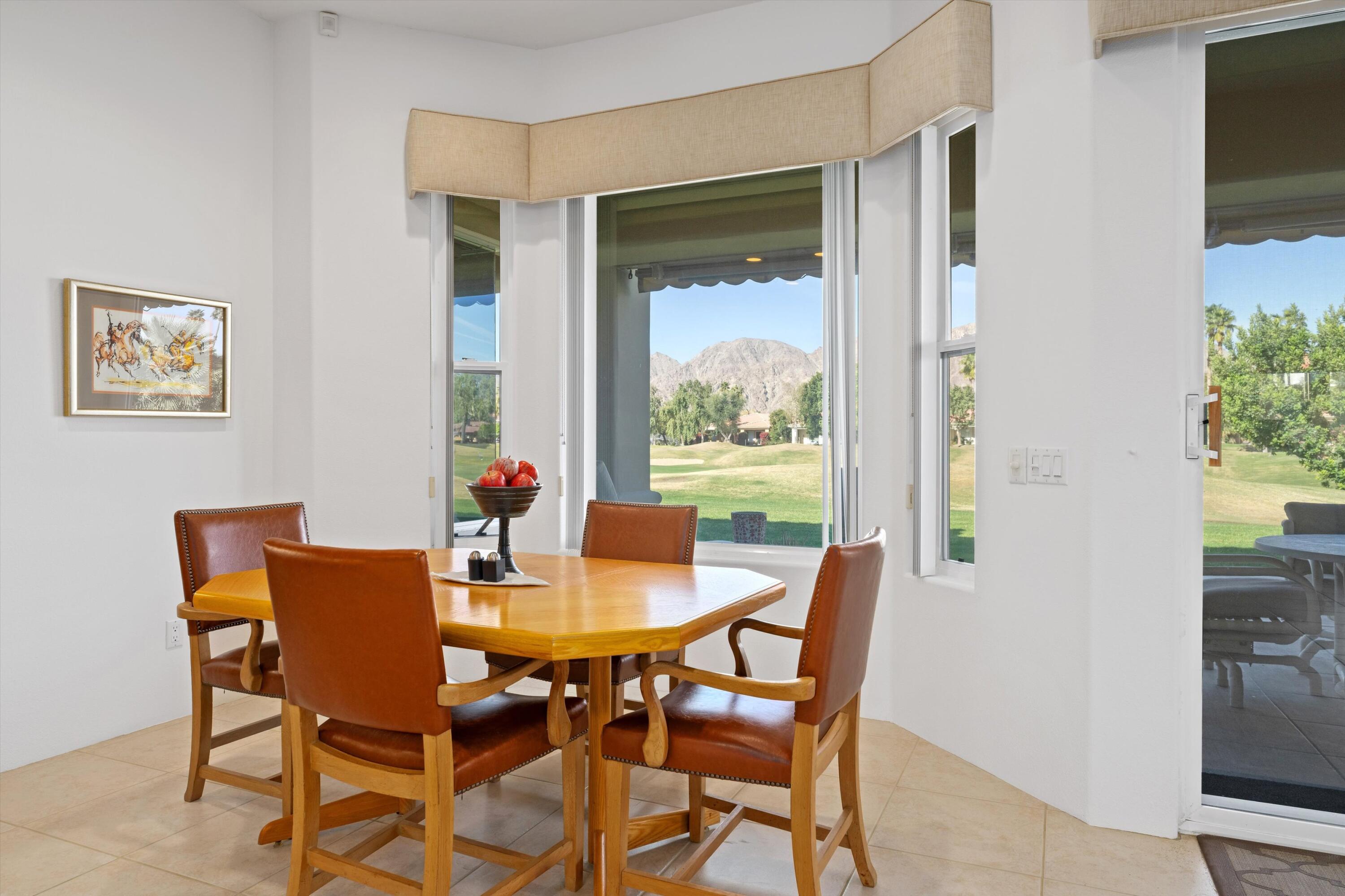55151 Laurel Valley La Quinta, CA 92253 - Photo 28 of 43 a dining room with furniture and window