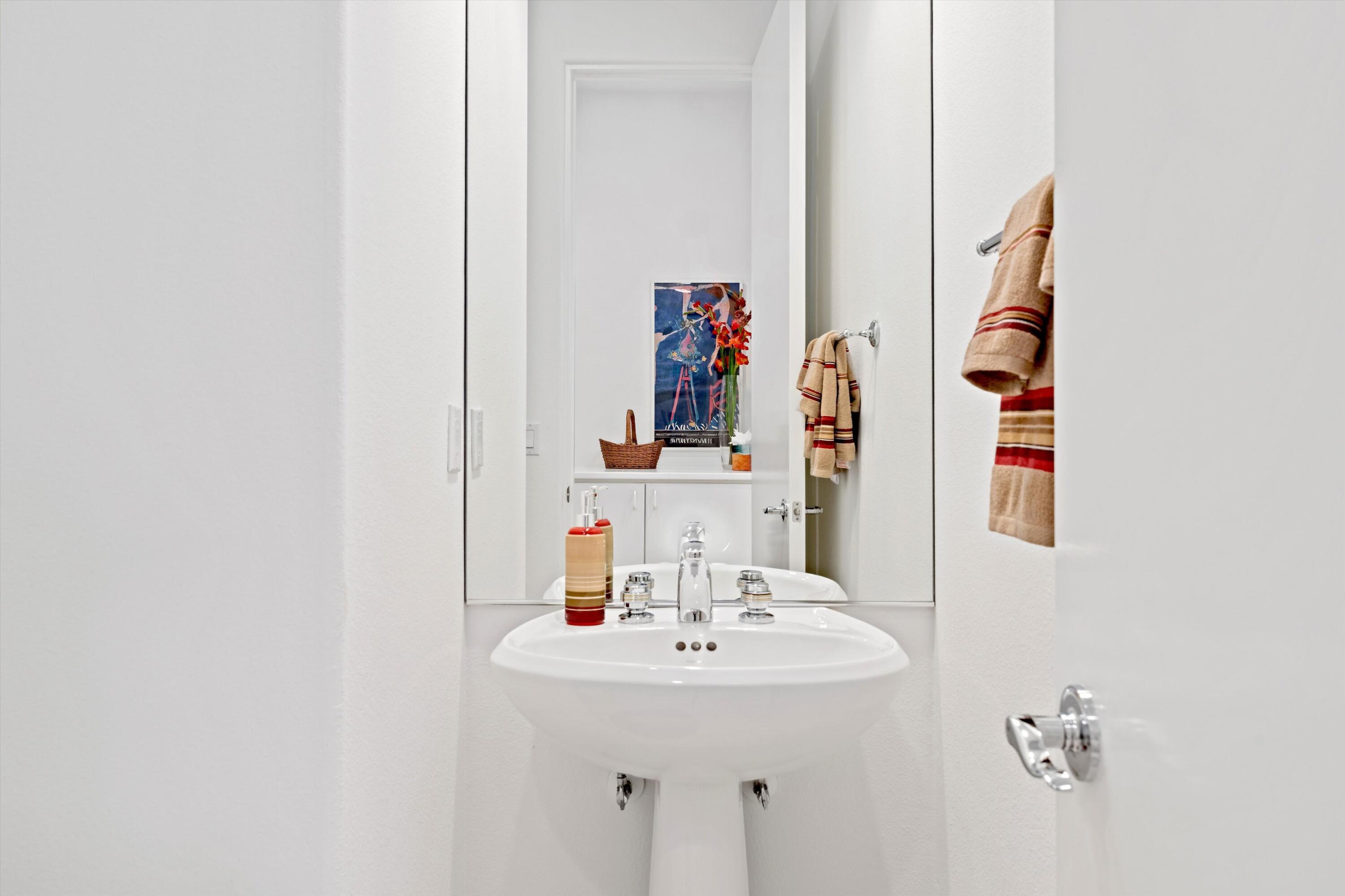 55151 Laurel Valley La Quinta, CA 92253 - Photo 29 of 43 a bathroom with a sink and a mirror