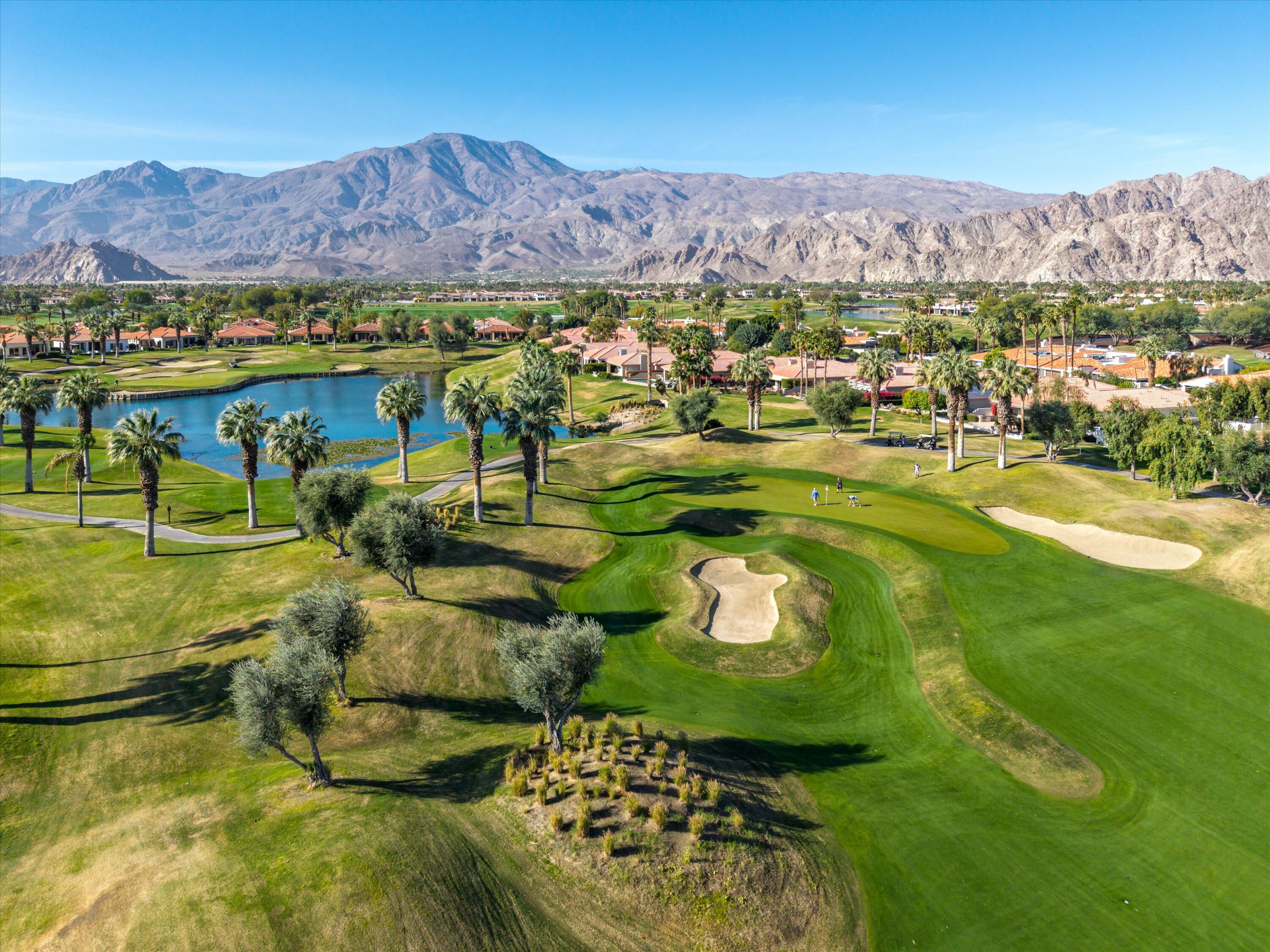 55151 Laurel Valley La Quinta, CA 92253 - Photo 6 of 43 a view of a city with mountains in the background