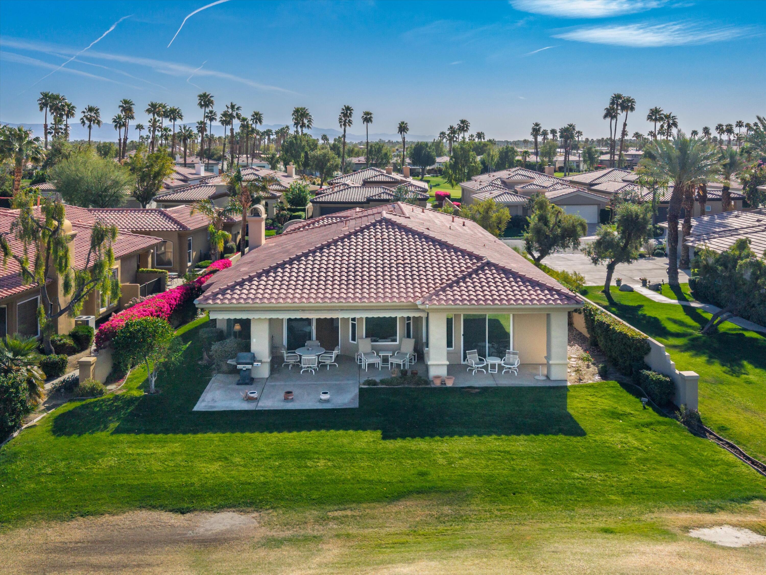 55151 Laurel Valley La Quinta, CA 92253 - Photo 7 of 43 a view of a house with a yard