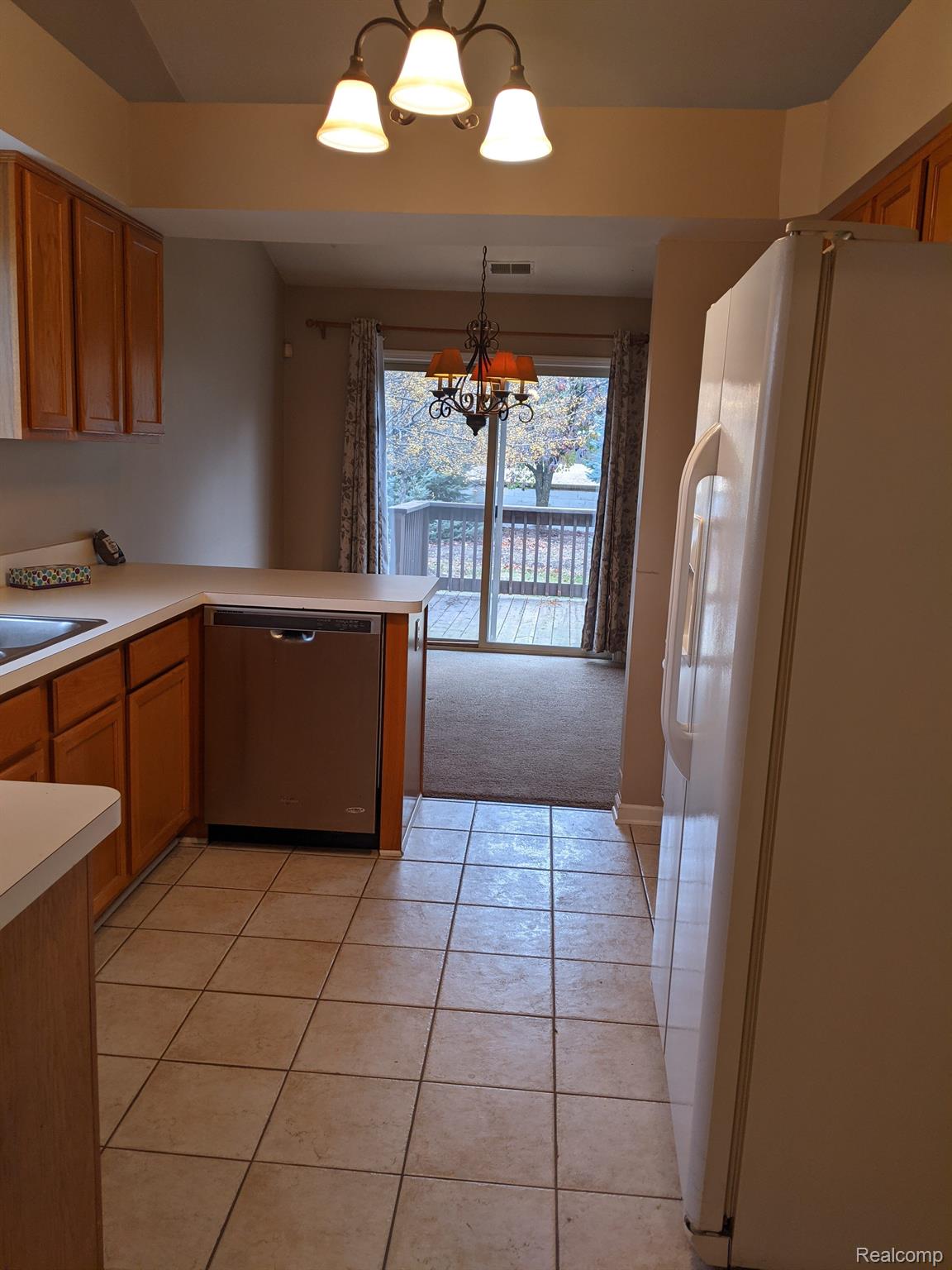 Kitchen entrance with view of dining area