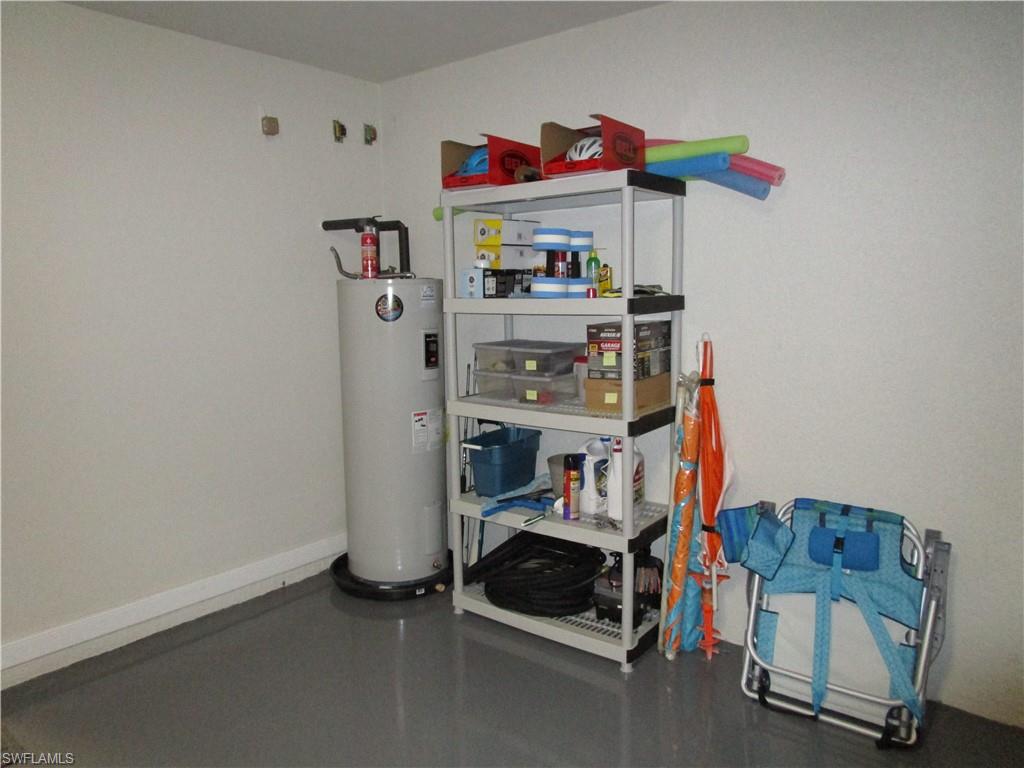 8677 Erice Court Naples, FL 34114 - Photo 22 of 42 a view of storage and utility room