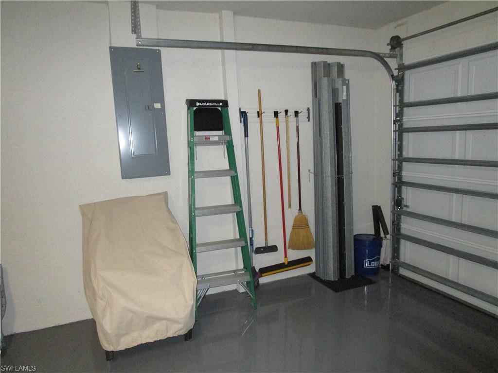 8677 Erice Court Naples, FL 34114 - Photo 23 of 42 a view of a room with a furniture