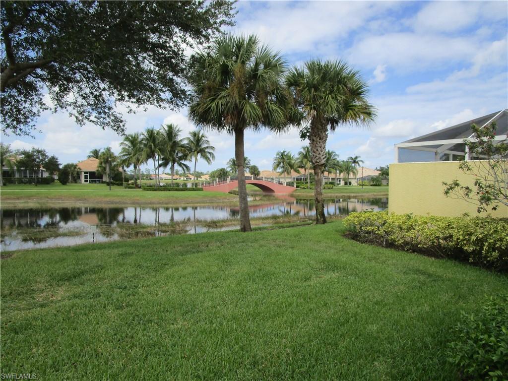 8677 Erice Court Naples, FL 34114 - Photo 25 of 42 a view of a park and trees with a big yard