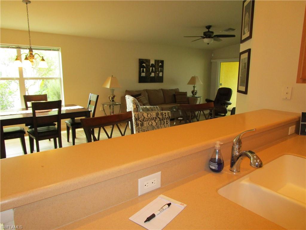 8677 Erice Court Naples, FL 34114 - Photo 32 of 42 a view of a room with gym equipment