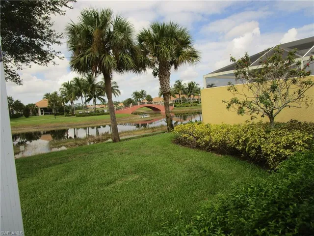 a view of a storage and utility room with washer and dryer