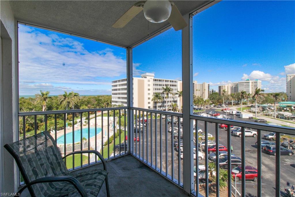 1 Bluebill Avenue, Unit 501 Naples, FL 34108 - Photo 2 of 38 a view of a balcony with furniture