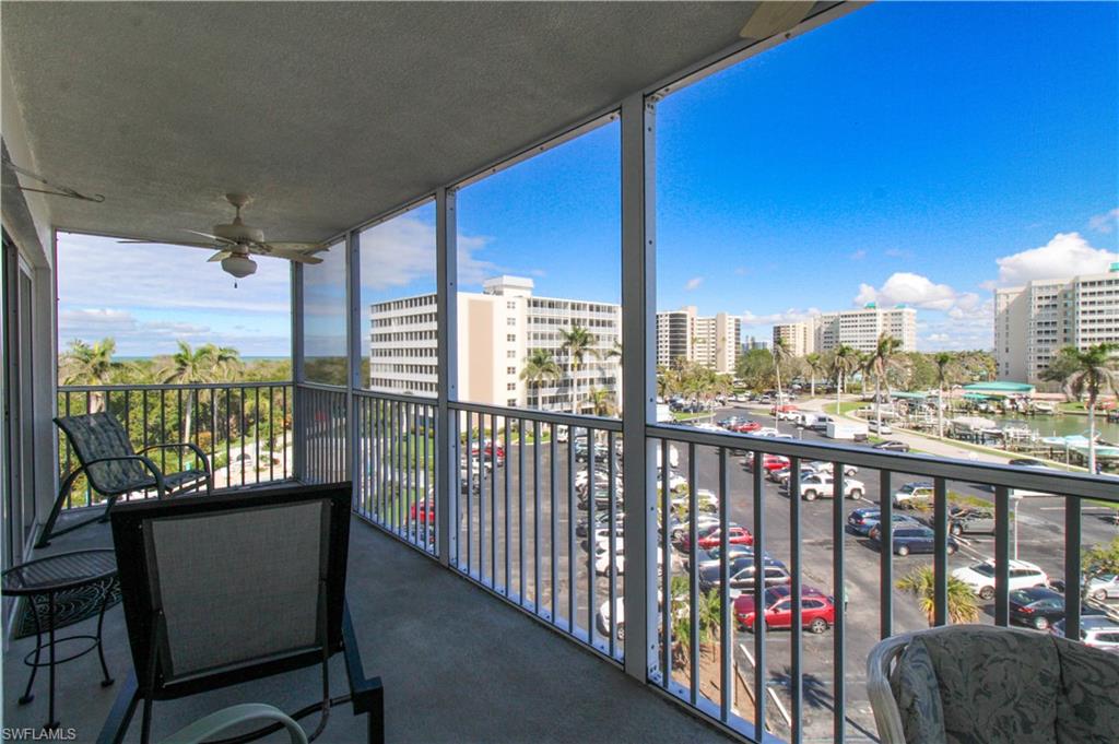 1 Bluebill Avenue, Unit 501 Naples, FL 34108 - Photo 4 of 38 a view of a city from a balcony