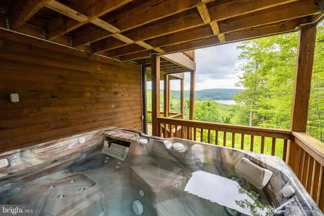 a view of a chairs and table in the patio