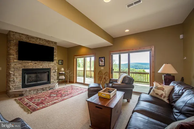 a living room with furniture and a rug